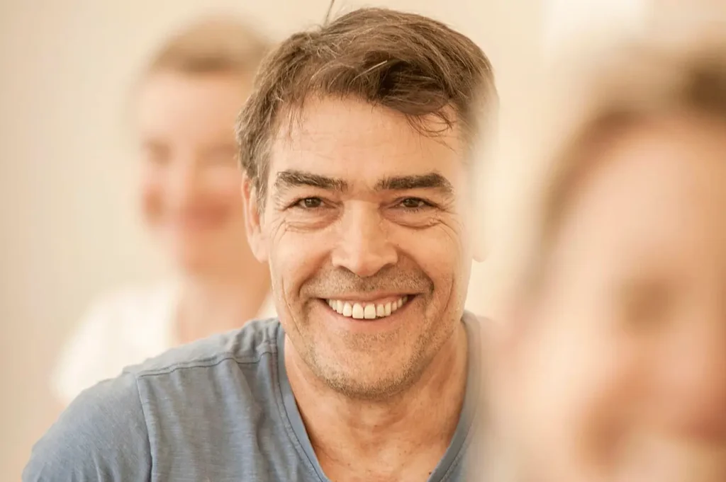 Zufriedener Teilnehmer beim Rückenglück Gruppentraining Wien